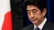 Japan's Prime Minister Shinzo Abe attends a news conference next to the national flag, which is hung with a black ribbon as a symbol of mourning for victims of the March 11, 2011 earthquake and tsunami, at his official residence in Tokyo March 11, 2013. Japan honoured the victims of its worst disaster since World War Two on Monday: the March 11, 2011 earthquake, tsunami and nuclear crisis that killed almost 19,000 people and stranded 315,000 evacuees, including refugees who fled radiation from the devastated Fukushima atomic plant. REUTERS/Yuya Shino (JAPAN - Tags: POLITICS DISASTER ANNIVERSARY) Japan's Prime Minister Shinzo Abe attends a news conference next to the national flag, which is hung with a black ribbon as a symbol of mourning for victims of the March 11, 2011 earthquake and tsunami, at his official residence in Tokyo March 11, 2013. Japan honoured the victims of its worst disaster since World War Two on Monday: the March 11, 2011 earthquake, tsunami and nuclear crisis that killed almost 19,000 people and stranded 315,000 evacuees, including refugees who fled radiation from the devastated Fukushima atomic plant. REUTERS/Yuya Shino (JAPAN - Tags: POLITICS DISASTER ANNIVERSARY)