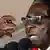 Zimbabwe's President Robert Mugabe gestures as he speaks during an event marking his 89th birthday at Chipadze stadium in Bindura, about 90 km (56 miles) north of the capital Harare March 2, 2013. Addressing a rally to mark his 89th birthday last week, Africa's oldest leader denied accusations by the rival Movement for Democratic Change (MDC) of Prime Minister Morgan Tsvangirai that ZANU-PF was playing dirty ahead of the presidential and parliamentary polls. REUTERS/Philimon Bulwayo (ZIMBABWE - Tags: POLITICS ENTERTAINMENT ELECTIONS)