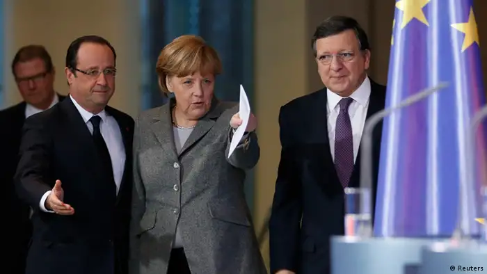President of the European Round Table of Industrialists Leif Johansson, French President Francois Hollande, German Chancellor Angela Merkel and European Commission President Jose Manuel Barroso (L-R) arrive for a news conference at the Chancellery in Berlin March 18, 2013. REUTERS/Fabrizio Bensch (GERMANY - Tags: BUSINESS POLITICS)