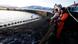 Workers at a salmon farm operated by ZAO Russky Losos, in Liinakhamari Workers at a salmon farm operated by ZAO Russky Losos, in Liinakhamari
