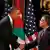 U.S. President Barack Obama (L) shakes hands with Jordan's King Abdullah after a joint news conference at Al Hummar Palace in Amman, March 22, 2013. REUTERS/Larry Downing (JORDAN - Tags: POLITICS)