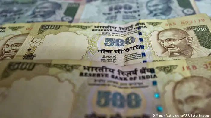 (FILES) - A file picture shows Indian Currency notes in New Delhi on December 7, 2011. India's central bank is expected to keep interest rates on hold on January 24, 2012, judging it too early to begin lowering them despite concerns over slowing growth in Asia's third-largest economy. Policymakers from the Reserve Bank of India (RBI) are to meet in the financial capital Mumbai, with pressure mounting from business leaders for the bank to help stimulate growth.AFP PHOTO/Manan VATSYAYANA (Photo credit should read MANAN VATSYAYANA/AFP/Getty Images)