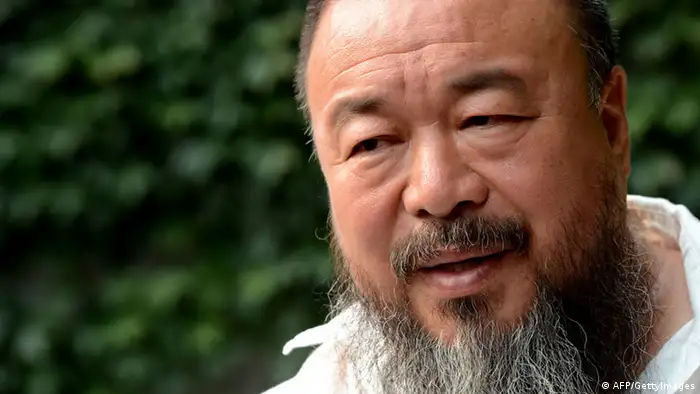 In a photo taken on June 25, 2012 Chinese artist Ai Weiwei speaks to AFP inside his compound in Beijing. Ai has a metaphor for the travel ban that will prevent him attending the growing number of exhibitions of his work being held around the world as his renown increases. AFP PHOTO / Ed Jones (Photo credit should read Ed Jones/AFP/GettyImages)