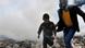 A Syrian man escorts a boy away from fumes as a street covered with uncollected garbage is fumigated in the northern city of Aleppo on March 24, 2013. Syria's mainstream insurgent Free Syrian Army does not recognise Ghassan Hitto, a rebel prime minister chosen by dissidents after hours of heated talks last week, a rebel official told AFP. AFP PHOTO/BULENT KILIC (Photo credit should read BULENT KILIC/AFP/Getty Images) A Syrian man escorts a boy away from fumes as a street covered with uncollected garbage is fumigated in the northern city of Aleppo on March 24, 2013. Syria's mainstream insurgent Free Syrian Army does not recognise Ghassan Hitto, a rebel prime minister chosen by dissidents after hours of heated talks last week, a rebel official told AFP. AFP PHOTO/BULENT KILIC (Photo credit should read BULENT KILIC/AFP/Getty Images)