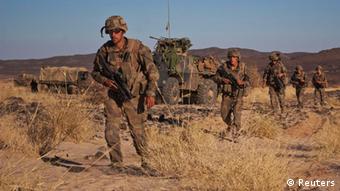 French soldiers patrol in the Terz valley, about 60 km (37 miles) south of the town of Tessalit in northern Mali, March 21, 2013. (Photo: REUTERS/Francois Rihouay)