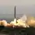 Start einer iranischen Rakete während eines Manövers - Foto: Fars
