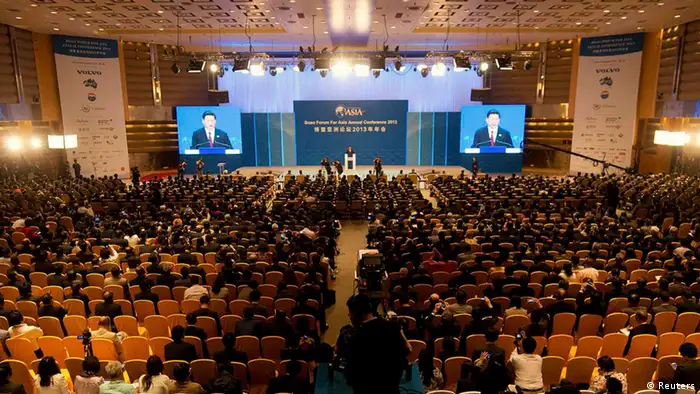 China's President Xi Jinping delivers a speech at the opening plenary of the Boao Forum for Asia in Boao, on the southern Chinese resort island of Hainan April 7, 2013. Jinping pledged on Sunday that change and peaceful development will power his country's economic rise and sustain growth within its borders and beyond. REUTERS/Ed Jones/Pool (CHINA - Tags: POLITICS BUSINESS)