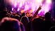 People having fun at a huge concert People having fun at a huge concert