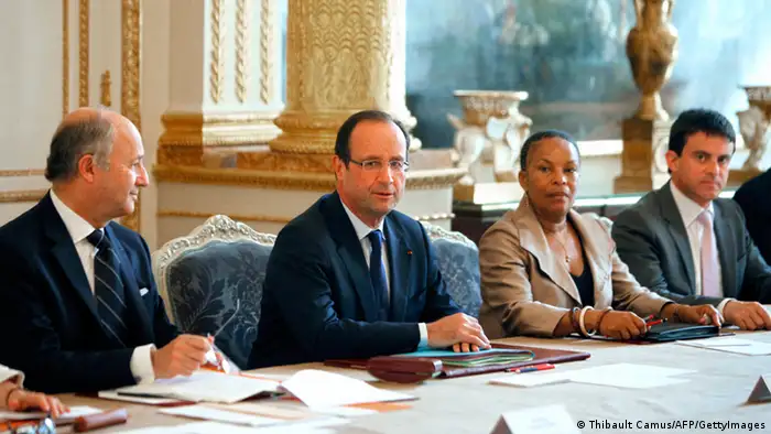 French President Francois Hollande (2ndL), Foreign Minister Laurent Fabius (L), Justice Minister Christiane Taubira (3rdL) and Interior Minister Manuel Valls (R) attend the weekly cabinet meeting at the Elysee Palace in Paris on June 27, 2012 in Paris. AFP PHOTO / POOL / THIBAULT CAMUS (Photo credit should read THIBAULT CAMUS/AFP/GettyImages)
