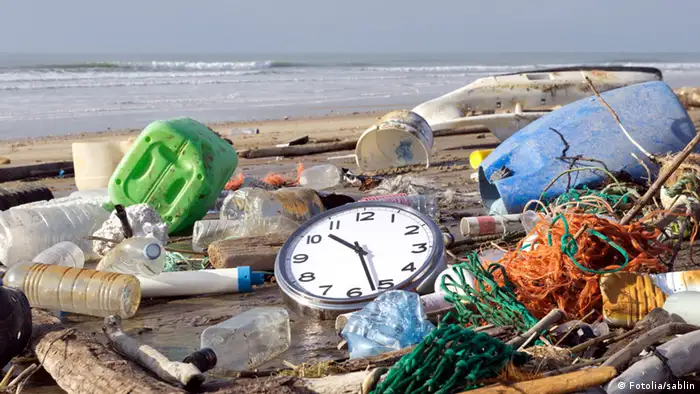 pollution; environmental damage; garbage; waste; rubbish; fishing net; toxic substance; beach; sable; landfill; water; water pollution; disaster; dirty; plastic; bottle; messy; bag; coastline; unhygienic; careless; fishing; environment; landscape; nature; ocean; sea; sadness; impact; recycling; global warming; concepts; symbol; time; clock; urgency; problems; deadline; ideas; countdown; clock face; running time; cleanup; blue sky; nobody; vertical; photography Schlagworte .Umwelt , Strand , Unrat , Kanister , Ostfriesland , Müll , Insel , .Strand , .Abfälle , .Unrat , Umwelt , Umwel , .Meere , .Strandgut , Meer , .Küste