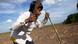 A boy hoists a machete during the sugarcane harvest in eastern Bolivia. (photo: Noah Friedman-Rudovsky) A boy hoists a machete during the sugarcane harvest in eastern Bolivia. (photo: Noah Friedman-Rudovsky)