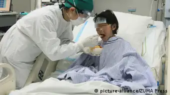 BEIJING, April 13, 2013 A medical worker feeds a seven-year-old girl infected with the H7N9 strain of bird flu at the Beijing Ditan Hospital in Beijing, capital of China, April 12, 2013. This was the first case of H7N9 infection in the Chinese capital. The child is in stable condition, and two people who have had close contact with the child have not shown any flu symptoms