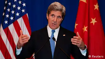 U.S. Secretary of State John Kerry attends a news conference in Beijing April 13, 2013. China and the United States will set up a working group on cyber-security, Kerry said on Saturday, as the two sides moved to ease months of tensions and mutual accusations of hacking and Internet theft. REUTERS/Paul J. Richards/Pool (CHINA - Tags: POLITICS SCIENCE TECHNOLOGY)