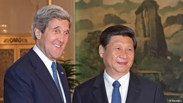 U.S. Secretary of State John Kerry (L) is greeted by Chinese President Xi Jinping shortly before their private meeting at the Great Hall of the People in Beijing April 13, 2013. Kerry met China's top leaders on Saturday in a bid to persuade them to exert pressure on North Korea to scale back its belligerent rhetoric and, eventually, return to nuclear talks. REUTERS/Paul J. Richards/Pool (CHINA - Tags: POLITICS)