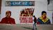 A woman walks past a mural depicting Venezuela's acting President and presidential candidate Nicolas Maduro (R) and Venezuela's late President Hugo Chavez in Caracas April 12, 2013. Chavez's self-declared socialist revolution will be put to the test at a presidential election on Sunday that pits Maduro, his chosen successor, against a younger rival promising change in the nation he polarized. The mural reads in Spanish, "Chavez lives, the fight goes on!". The banner on top reads, "Chavez, heart of my country". REUTERS/Tomas Bravo (VENEZUELA - Tags: POLITICS ELECTIONS TPX IMAGES OF THE DAY) A woman walks past a mural depicting Venezuela's acting President and presidential candidate Nicolas Maduro (R) and Venezuela's late President Hugo Chavez in Caracas April 12, 2013. Chavez's self-declared socialist revolution will be put to the test at a presidential election on Sunday that pits Maduro, his chosen successor, against a younger rival promising change in the nation he polarized. The mural reads in Spanish, "Chavez lives, the fight goes on!". The banner on top reads, "Chavez, heart of my country". REUTERS/Tomas Bravo (VENEZUELA - Tags: POLITICS ELECTIONS TPX IMAGES OF THE DAY)