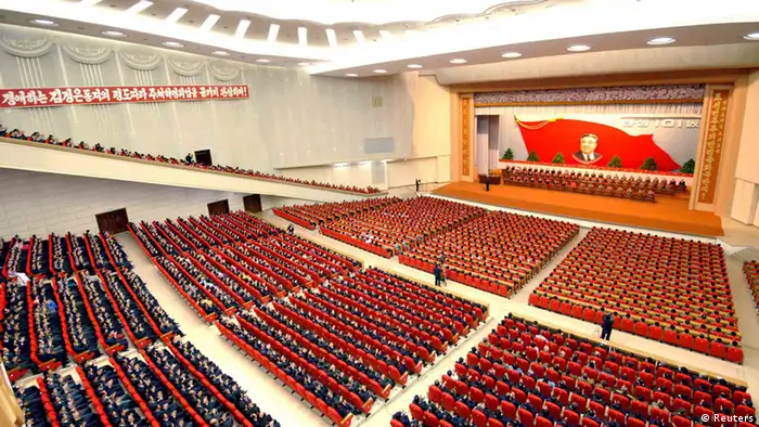 Attendees applaud during a central report meeting to celebrate the 101st birth anniversary of North Korean founder Kim Il-Sung, at the April 25 Culture Hall in Pyongyang, in this photo distributed by North Korea's Korean Central News Agency (KCNA) on April 14, 2013. (NORTH KOREA - Tags: POLITICS ANNIVERSARY) ATTENTION EDITORS - THIS PICTURE WAS PROVIDED BY A THIRD PARTY. REUTERS IS UNABLE TO INDEPENDENTLY VERIFY THE AUTHENTICITY, CONTENT, LOCATION OR DATE OF THIS IMAGE. THIS PICTURE IS DISTRIBUTED EXACTLY AS RECEIVED BY REUTERS, AS A SERVICE TO CLIENTS. NO THIRD PARTY SALES. NOT FOR USE BY REUTERS THIRD PARTY DISTRIBUTORS. QUALITY FROM SOURCE
