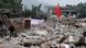 A man walks past a Chinese national flag planted on debris on the second day after an earthquake hit Longmen township of Lushan county, Sichuan province April 21, 2013. Rescuers struggled to reach a remote corner of southwestern China on Sunday as the toll of the dead and missing from the country's worst earthquake in three years climbed to 203 with more than 11,000 injured. The 6.6 magnitude quake struck in Lushan county, near the city of Ya'an in the southwestern province of Sichuan, close to where a devastating 7.9 temblor hit in May 2008 killing some 70,000. REUTERS/Stringer (CHINA - Tags: DISASTER) CHINA OUT. NO COMMERCIAL OR EDITORIAL SALES IN CHINA A man walks past a Chinese national flag planted on debris on the second day after an earthquake hit Longmen township of Lushan county, Sichuan province April 21, 2013. Rescuers struggled to reach a remote corner of southwestern China on Sunday as the toll of the dead and missing from the country's worst earthquake in three years climbed to 203 with more than 11,000 injured. The 6.6 magnitude quake struck in Lushan county, near the city of Ya'an in the southwestern province of Sichuan, close to where a devastating 7.9 temblor hit in May 2008 killing some 70,000. REUTERS/Stringer (CHINA - Tags: DISASTER) CHINA OUT. NO COMMERCIAL OR EDITORIAL SALES IN CHINA