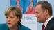 Polish Prime Minister Donald Tusk (R) and German Chancellor Angela Merkel chat before leaving the venue where they held a discussion on 'Europe' in Berlin on April 22, 2013. The discussion coincides with the release of a biography of Merkel by German author and journalist Stefan Kornelius. AFP PHOTO / JOHN MACDOUGALL (Photo credit should read JOHN MACDOUGALL/AFP/Getty Images) Polish Prime Minister Donald Tusk (R) and German Chancellor Angela Merkel chat before leaving the venue where they held a discussion on 'Europe' in Berlin on April 22, 2013. The discussion coincides with the release of a biography of Merkel by German author and journalist Stefan Kornelius. AFP PHOTO / JOHN MACDOUGALL (Photo credit should read JOHN MACDOUGALL/AFP/Getty Images)
