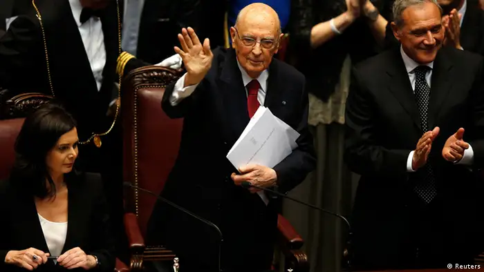 Italy's newly re-elected president Giorgio Napolitano (C) waves at the end of his speech flanked by lower house President Laura Boldrini (L) and her upper house counterpart Pietro Grasso at the lower house of the parliament in Rome, April 22, 2013. Napolitano said on Monday he had agreed to his re-election as head of state because of an unprecedented political deadlock and threatened to resign if politicians failed to implement vital reforms. REUTERS/Tony Gentile (ITALY - Tags: POLITICS)
