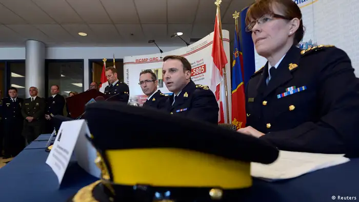RCMP Chief Superintendent Jennifer Strachan (R), Assistant Commissioner James Malizia (C) and Chief Superintendent Gaeten Courchesne (L) speak during a news conference in Toronto, Ontario, April 22, 2013. Canadian police said on Monday they had arrested and charged two men with an al Qaeda-supported plot to derail a VIA passenger train. The RCMP said it had arrested Chiheb Esseghaier, 30, of Montreal, and Raed Jaser, 35, of Toronto in connection with the plot, which authorities said was not linked to the Boston Marathon bombings, but likely had connections to al-Qaeda. REUTERS/Aaron Harris (CANADA - Tags: CRIME LAW TRANSPORT CIVIL UNREST)