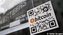 BERLIN, GERMANY - APRIL 11: A sticker on the window of a local pub indicates the acceptance of Bitcoins for payment on April 11, 2013 in Berlin, Germany. Bitcoins are a digital currency traded on the MTGox exchange, and the value of the virtual money fluctuated from USD 260 per bitcoin down to USD 130 per bitcoin yesterday and recovered somewhat in trading today. (Photo by Sean Gallup/Getty Images)