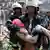 Bildnummer: 59562356 Datum: 24.04.2013 Copyright: imago/Xinhua (130424) -- DHAKA, April 24, 2013 (Xinhua) -- A rescuer carries an injured person after a building collapsed in Savar, Bangladesh, April 24, 2013. At least 70 were killed and over six hundred injured after an eight-storey building in Savar on the outskirts of the Bangladeshi capital Dhaka collapsed on Wednesday morning. (Xinhua/Shariful Islam)(zcc) BANGLADESH-DHAKA-BUILDING-COLLAPSE PUBLICATIONxNOTxINxCHN Gesellschaft Einsturz Gebäude Gebäudeeinsturz Einkaufszentrum xcb x2x 2013 quer premiumd Aufmacher 59562356 Date 24 04 2013 Copyright Imago XINHUA Dhaka April 24 2013 XINHUA a Rescuer carries to Injured Person After a Building Collapsed in Savar Bangladesh April 24 2013 AT least 70 Were KILLED and Over Six Hundred Injured After to Eight storey Building in Savar ON The outskirts of The Bangladeshi Capital Dhaka Collapsed ON Wednesday Morning XINHUA Shariful Islam ZCC Bangladesh Dhaka Building Collapse PUBLICATIONxNOTxINxCHN Society Collapse Building Building collapse Shopping Centre x2x 2013 horizontal premiumd Highlight