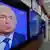 Владимир Путин на экране телевизора