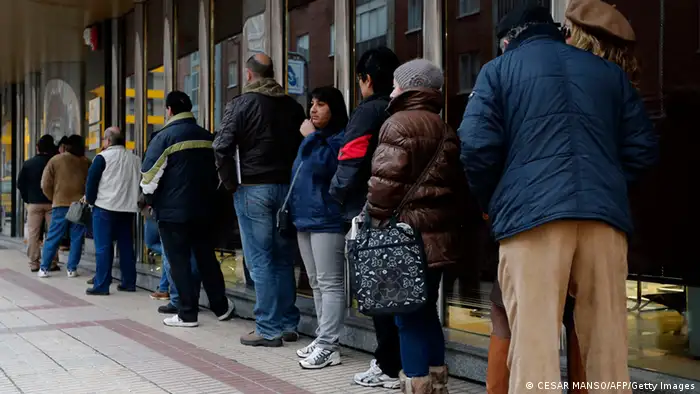 People queue outside a government employment office in Burgos on February 4, 2013.The number of Spaniards officially registered as unemployed rose to 4.98 million in January, according to Labour Ministry data released today, as the country's recession deepened. AFP PHOTO / CESAR MANSO (Photo credit should read CESAR MANSO/AFP/Getty Images)