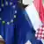 ARCHIV - Die EU-Flagge und die Flagge von Kroatien wehen in Zagreb (Archivfoto vom 09.12.2011). Die Kroaten haben dem Beitritt ihres Landes zur Europäischen Union zugestimmt. Beim Referendum am Sonntag hätten 67 Prozent mit Ja gestimmt. Das berichtete die staatliche Wahlkommission in Zagreb am Abend nach Auszählung von einem Viertel der Stimmzettel. Damit kann das Land am 1. Juli 2013 das 28. EU-Mitglied werden. Die bis dahin notwendige Ratifizierung des Beitrittsvertrages durch alle bisherigen EU-Staaten gilt als Formsache. EPA/ANTONIO BAT +++(c) dpa - Bildfunk+++