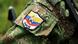 Picture of a badge on the arm of member of the Revolutionary Armed Forces of Colombia (FARC) guerrillas, taken while he guards the mountainous region of the department of Cauca, around Montealagre, Colombia, on February 15, 2013 after they released Colombian police officers Victor Alfonso Gonzalez and Cristian Camilo Yate LUIS ROBAYO/AFP/Getty Images Picture of a badge on the arm of member of the Revolutionary Armed Forces of Colombia (FARC) guerrillas, taken while he guards the mountainous region of the department of Cauca, around Montealagre, Colombia, on February 15, 2013 after they released Colombian police officers Victor Alfonso Gonzalez and Cristian Camilo Yate LUIS ROBAYO/AFP/Getty Images