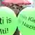 Luftballons mit der Aufschrift "Multi ist Kulti" und "Kein Kiez für Nazis" hält eine Frau beim MyFest, dem traditionellen Fest zum 1. Mai, am 01.05.2013 in Kreuzberg in Berlin. Foto: Stephanie Pilick/dpa