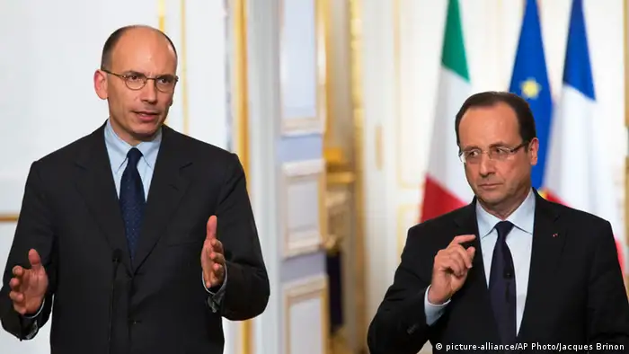 French President Francois Hollande, right, listens to Italy's Prime Minister Enrico Letta during a press conference at the Elysee Palace in Paris, Wednesday, May 1, 2013. (AP Photo/Jacques Brinon)