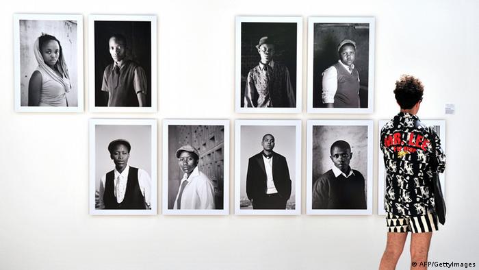 Eight portraits of Zanele Muholi presented at an exhibition