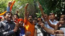 Activists from hardline Hindu group Bajrang Dal shout slogans during a protest after the death of Sarabjit Singh, who was convicted of spying for India and sentenced to death in Pakistan, in New Delhi May 3, 2013. India reacted furiously to Thursday's death in a Pakistani jail of an Indian farmer convicted of spying who was badly beaten last week by fellow inmates, the latest incident to strain relations between the neighbours. Singh was arrested in Pakistan in 1991 and sentenced to death for spying and carrying out four bomb blasts that killed 14 people. His family says he was an innocent farmer who was arrested after drunkenly wandering over the border. REUTERS/Mansi Thapliyal (INDIA - Tags: POLITICS CIVIL UNREST)