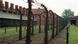 File picture dated 19 May 1993 of the electrified perimeter fence, accommodation blocks and a watchtower at Auschwitz. The world prepares to mark Holocaust Memorial Day on Thursday 27 January 2005 marking the 60th anniversary of the end of the Holocaust, and the liberation of the Nazi death camps, including Auschwitz in Poland. EPA/STR +++(c) dpa - Report+++ File picture dated 19 May 1993 of the electrified perimeter fence, accommodation blocks and a watchtower at Auschwitz. The world prepares to mark Holocaust Memorial Day on Thursday 27 January 2005 marking the 60th anniversary of the end of the Holocaust, and the liberation of the Nazi death camps, including Auschwitz in Poland. EPA/STR +++(c) dpa - Report+++