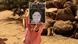 woman holds up poster woman holds up poster