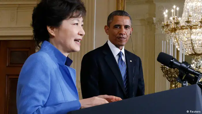 South Korea's President Park Geun-hye (L) addresses a joint news conference as U.S. President Barack Obama (R) listens in the East Room of the White House in Washington, May 7, 2013. REUTERS/Jason Reed (UNITED STATES - Tags: POLITICS)
