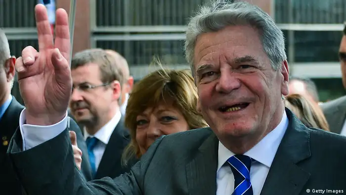 German President Joachim Gauck waves to journalists during a tourr in Bogota, on May 9, 2013. Gauck is on a four-day official visit to Colombia. AFP PHOTO/Luis Acosta (Photo credit should read LUIS ACOSTA/AFP/Getty Images)