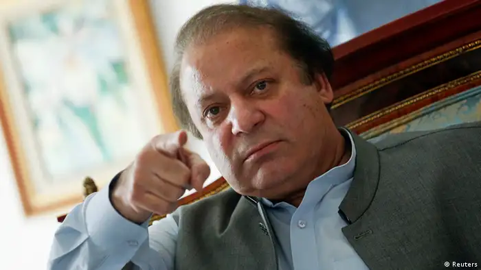 Nawaz Sharif, the leader of Pakistan Muslim League - Nawaz (PML-N) points as he speaks to foreign reporters at his residence in Lahore May 13, 2013. Sharif, who is poised for victory after Pakistan's May 11 election, said he had spoken at length with Prime Minister Manmohan Singh of rival India and would work to ease mistrust. REUTERS/Damir Sagolj (PAKISTAN - Tags: PROFILE ELECTIONS POLITICS)