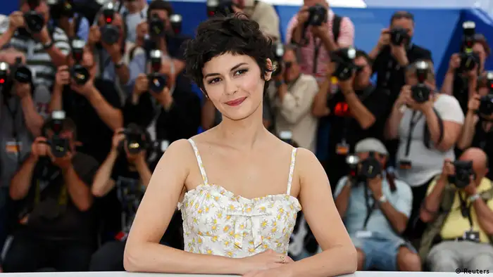 French actress Audrey Tautou, mistress of ceremony of the 66th Cannes Film Festival, poses during a photocall on the eve of the opening of the Festival in Cannes May 14, 2013. The 66th Cannes Film Festival will run from May 15 to May 26. REUTERS/Eric Gaillard (FRANCE - Tags: ENTERTAINMENT)