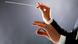 Baton in a conductor's hands Baton in a conductor's hands