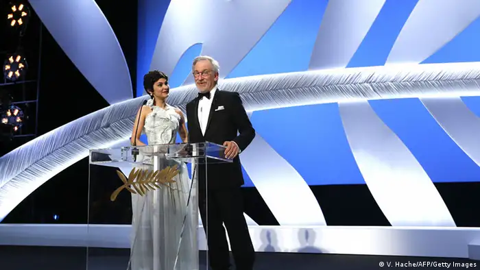 US director and President of the Feature Film Jury Steven Spielberg (R) speaks on May 15, 2013 next to French actress and mistress of ceremonies at the Cannes Film Festival Audrey Tautou during the opening of the 66th edition of the Cannes Film Festival in Cannes. Cannes, one of the world's top film festivals, opens on May 15 and will climax on May 26 with awards selected by a jury headed this year by Hollywood legend Steven Spielberg. AFP PHOTO / VALERY HACHE (Photo credit should read VALERY HACHE/AFP/Getty Images) 