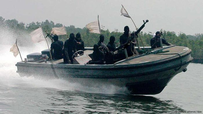 Nigerian militants patrol the creeks of the Niger delta. (Photo: George EsirI)