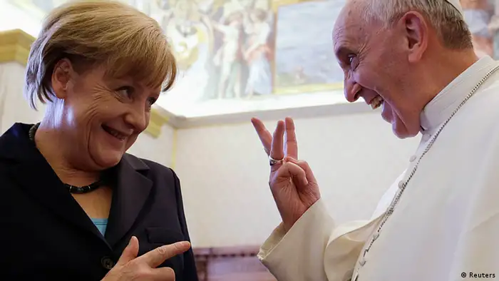 Pope Francis (R) gestures as he talks to German Chancellor Angela Merkel during a private audience at the Vatican, May 18, 2013. REUTERS/Gregorio Borgia/Pool (VATICAN - Tags: RELIGION POLITICS TPX IMAGES OF THE DAY)