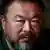 Dissedent Chinese artist Ai Weiwei reacts during a group interview at his studio in Beijing May 22, 2013. Ai made his first foray into the musical world on Wednesday with the release of the top single from his debut album, a song called "Dumbass" that takes inspiration from his detention in 2011. The video for the heavy metal song, which was directed by Ai with cinematography by acclaimed filmmaker Christopher Doyle, depicts Ai's 81 days in secretive detention in 2011, which sparked an international outcry. REUTERS/Petar Kujundzic (CHINA - Tags: POLITICS SOCIETY)