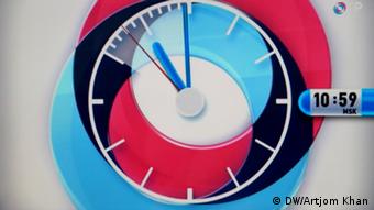 Эмблема телеканала - циферблат в расфокусе