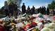 People view flowers left outside an army barracks near the scene of a killing in Woolwich, southeast London May 23, 2013. British authorities believe that two men accused of hacking a soldier to death on a London street in revenge for wars in Muslim countries are British of Nigerian descent, a source close to the investigation said Thursday. REUTERS/Luke MacGregor (BRITAIN - Tags: CRIME LAW MILITARY POLITICS) People view flowers left outside an army barracks near the scene of a killing in Woolwich, southeast London May 23, 2013. British authorities believe that two men accused of hacking a soldier to death on a London street in revenge for wars in Muslim countries are British of Nigerian descent, a source close to the investigation said Thursday. REUTERS/Luke MacGregor (BRITAIN - Tags: CRIME LAW MILITARY POLITICS)