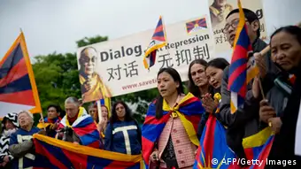 GettyImages 169510481 Free Tibet protestors demonstrate as the German Chancellor and China's new prime minister meet at the Chancellery in Berlin on May 26, 2013. Chinese Prime Minister Li Keqiang is on his first political tour as the new Chinese premier. Germany is his country's largest trading partner in the European Union. The two major exporters seek to further strengthen economic ties amidst ongoing trade conflicts between Beijing and the EU. AFP PHOTO / ODD ANDERSEN (Photo credit should read ODD ANDERSEN/AFP/Getty Images)
