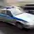 Автомобиль полиции со включенным проблесковым маячком