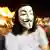 Man wearing V for Vendetta "Guy Fawkes Mask"